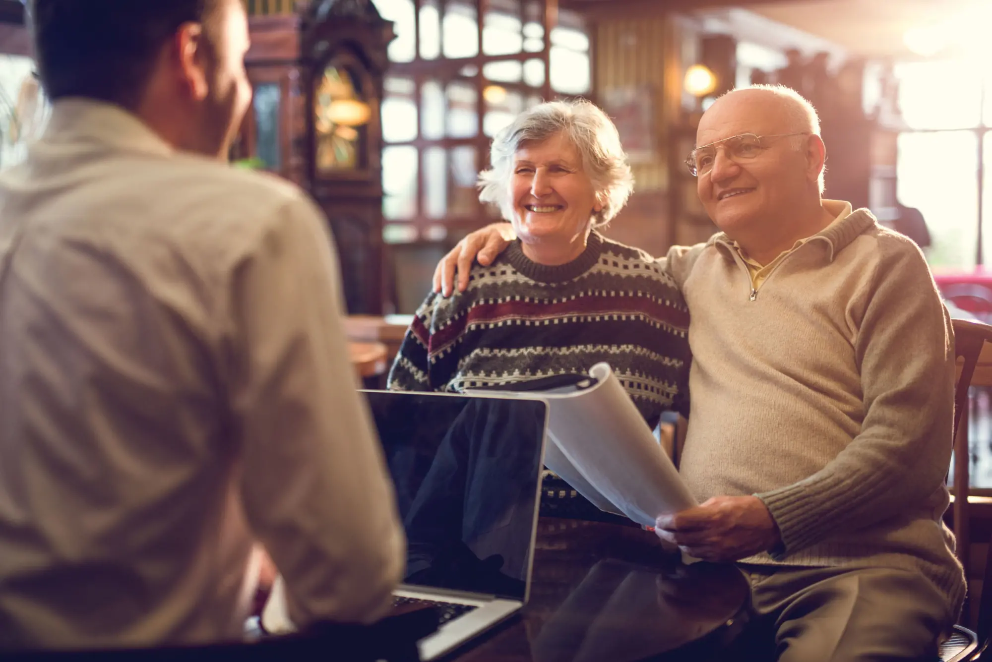 Donor couple meeting with a financial advisor
